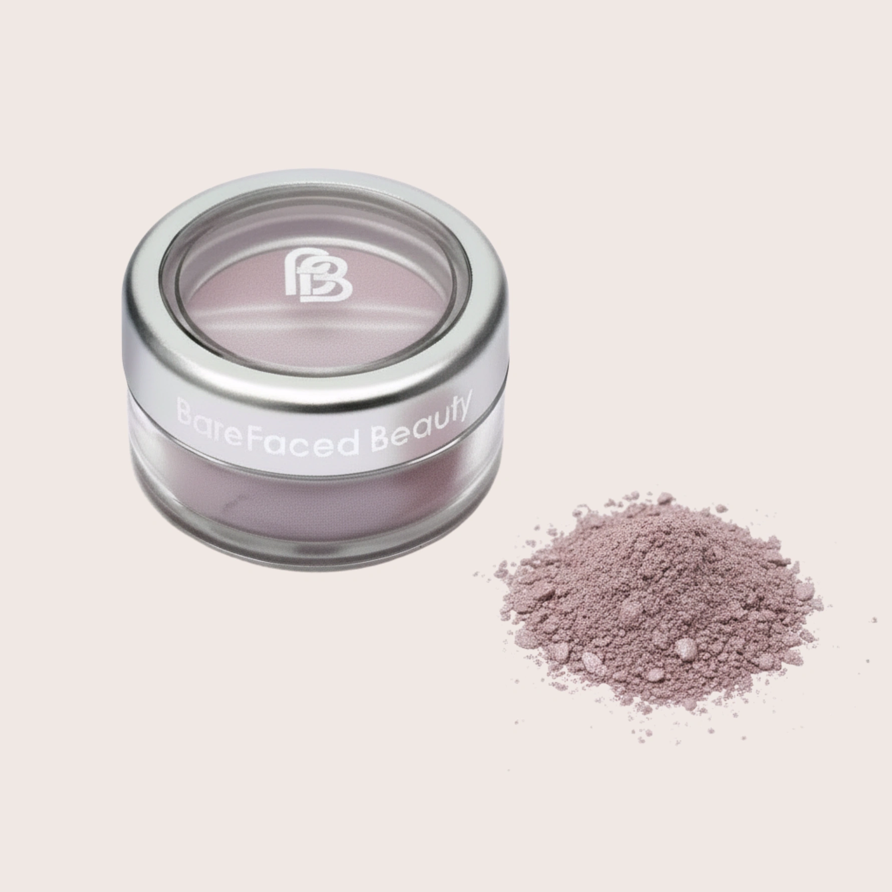 Mineral eyeshadow jar beside a small heap of loose mauve pigment